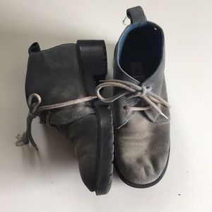 Faded blue suede shoes